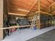 Organized barn interior with storage space, equipment, and access to horse stalls, ideal for farm operations at 7041 Ne 22Nd Court Rd, Ocala, FL 34479