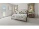 Beautiful bedroom with neutral tones, plush carpet, and natural light, with outdoor view at 7041 Ne 22Nd Court Rd, Ocala, FL 34479
