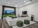 Bright, modern living room with large windows overlooking the pasture and barn at 7041 Ne 22Nd Court Rd, Ocala, FL 34479