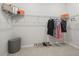 Walk-in closet showcasing organized shelving, hanging racks, and ample storage space for clothes and accessories at 7041 Ne 22Nd Court Rd, Ocala, FL 34479