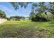 Expansive backyard with a playset and ample room for recreation at 710 Barwick St, Wildwood, FL 34785