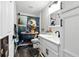 Charming bathroom with a dinosaur-themed shower curtain and modern white vanity at 710 Barwick St, Wildwood, FL 34785