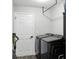 Laundry room with new washer and dryer units and white walls at 710 Barwick St, Wildwood, FL 34785