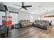 Spacious living room with comfortable seating, natural light, and stylish decor at 710 Barwick St, Wildwood, FL 34785