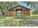 Exterior of a barn with wood and metal at 7220 Nw 83 Ter, Ocala, FL 34482