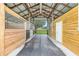 The interior of a barn showing the stalls at 7220 Nw 83 Ter, Ocala, FL 34482