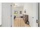Well-lit bedroom with wood floors and natural light coming through the window at 7220 Nw 83 Ter, Ocala, FL 34482