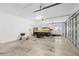 The garage has a door to the outside and lots of storage at 7220 Nw 83 Ter, Ocala, FL 34482
