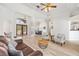 Elegant living room with neutral tones and an open design for seamless entertaining at 7220 Nw 83 Ter, Ocala, FL 34482