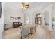 Spacious living room with high ceilings and an open layout, filled with natural light at 7220 Nw 83 Ter, Ocala, FL 34482