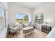 Sitting area featuring a large window with a scenic view of the property at 7220 Nw 83 Ter, Ocala, FL 34482