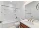 Full bathroom featuring a shower-tub combo, single sink vanity, and neutral color palette at 7707 Sw 94Th Cir, Ocala, FL 34481