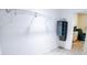 Organized walk-in closet with wood-look floors and ample shelving for storage at 7765 Sw 86Th Loop, Ocala, FL 34476