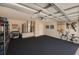 Clean and organized two-car garage with ample storage space and epoxy floor at 8187 Sw 60Th Ter, Ocala, FL 34476