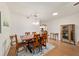 Dining room showcasing a wooden table with seating and modern decor at 8677 Sw 95Th Ln # A, Ocala, FL 34481