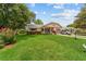 Charming single-story home with a well-maintained lawn, inviting front porch, and attached garage at 8677 Sw 95Th Ln # A, Ocala, FL 34481