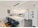 Bright kitchen featuring a breakfast bar and modern finishes at 8677 Sw 95Th Ln # A, Ocala, FL 34481