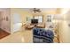 Inviting living room with comfortable seating, a ceiling fan, and lots of light at 9065 Sw 82Nd Ter # G, Ocala, FL 34481