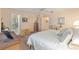 Comfortable main bedroom with natural light, ceiling fan, and en-suite bathroom access at 9065 Sw 82Nd Ter # G, Ocala, FL 34481