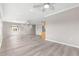 The spacious living room offers hardwood floors, ceiling fans and lots of natural light at 9415 Se 125Th St, Summerfield, FL 34491
