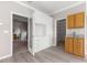 Bright living room offers a mix of cabinetry and a view into another carpeted room at 9415 Se 125Th St, Summerfield, FL 34491