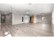 The spacious living room features hardwood floors and natural light at 9415 Se 125Th St, Summerfield, FL 34491