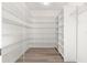 Walk-in closet includes built-in wire shelving to maximize storage space at 9415 Se 125Th St, Summerfield, FL 34491