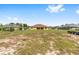 Large grassy backyard ready for outdoor activities and relaxation at 9562 Sw 45Th Ave, Ocala, FL 34476