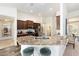 Stylish kitchen with granite countertops, stainless steel appliances, and dark wood cabinetry at 9562 Sw 45Th Ave, Ocala, FL 34476