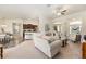 Bright living room overlooking the kitchen and dining area, perfect for entertaining at 9562 Sw 45Th Ave, Ocala, FL 34476