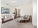 Spacious living room with neutral palette, comfortable sofa, and chaise lounge at 9562 Sw 45Th Ave, Ocala, FL 34476