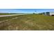 A community airstrip with adjacent hangars for aviation enthusiasts at 9706 Sw 92Nd Place Rd, Ocala, FL 34481