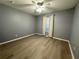 Bedroom featuring ceiling fan and light grey walls at 9706 Sw 92Nd Place Rd, Ocala, FL 34481