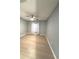 Spacious bedroom with wood flooring and neutral paint at 9706 Sw 92Nd Place Rd, Ocala, FL 34481