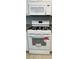 Close-up of a white Frigidaire gas range and microwave in a modern kitchen at 9706 Sw 92Nd Place Rd, Ocala, FL 34481