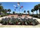 A memorial site with flags, palm trees, and benches, honoring service and community at 9706 Sw 92Nd Place Rd, Ocala, FL 34481