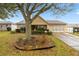Charming single-story home with a well-manicured lawn and mature tree in a desirable neighborhood at 9710 Sw 96Th St, Ocala, FL 34481