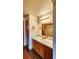 Bright bathroom boasts a long vanity with lots of cabinets and a well-lit mirror at 16905 Sw 30Th Avenue Rd, Ocala, FL 34473