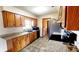 Well-equipped kitchen featuring granite countertops, ample cabinet space, and stainless steel appliances at 16905 Sw 30Th Avenue Rd, Ocala, FL 34473