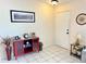 Entryway featuring neutral walls, tile flooring, and decorative furnishings at 10130 Sw 61St Terrace Rd, Ocala, FL 34476