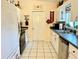 Kitchen featuring black appliances and ample countertop space at 10130 Sw 61St Terrace Rd, Ocala, FL 34476