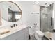 Stylish bathroom offers modern fixtures, a walk-in shower, and a marble countertop at 10600 Se 32Nd Ave, Ocala, FL 34480