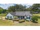 Charming front exterior with landscaping and a cozy porch at 10600 Se 32Nd Ave, Ocala, FL 34480