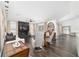 Spacious living room featuring a stone fireplace, ample seating, and stylish decor at 10600 Se 32Nd Ave, Ocala, FL 34480