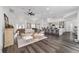 Spacious, open-concept living area with stylish decor and seamless flow at 10600 Se 32Nd Ave, Ocala, FL 34480