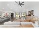 Bright, open-concept living area with dark hardwood floors and stylish decor at 10600 Se 32Nd Ave, Ocala, FL 34480