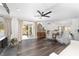 Bright living room featuring modern furnishings and a sliding glass door to outdoor patio at 10600 Se 32Nd Ave, Ocala, FL 34480