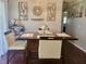 Inviting dining room featuring modern decor, a wooden table, and stylish chairs at 10945 Sw 75Th Ave, Ocala, FL 34476