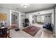 Inviting living room featuring a connected dining area with ample space for entertaining and relaxation at 1330 Ne 55Th St, Ocala, FL 34479