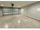 Spacious two car garage with modern garage door and epoxy floors at 13305 Sw 114Th Pl, Dunnellon, FL 34432